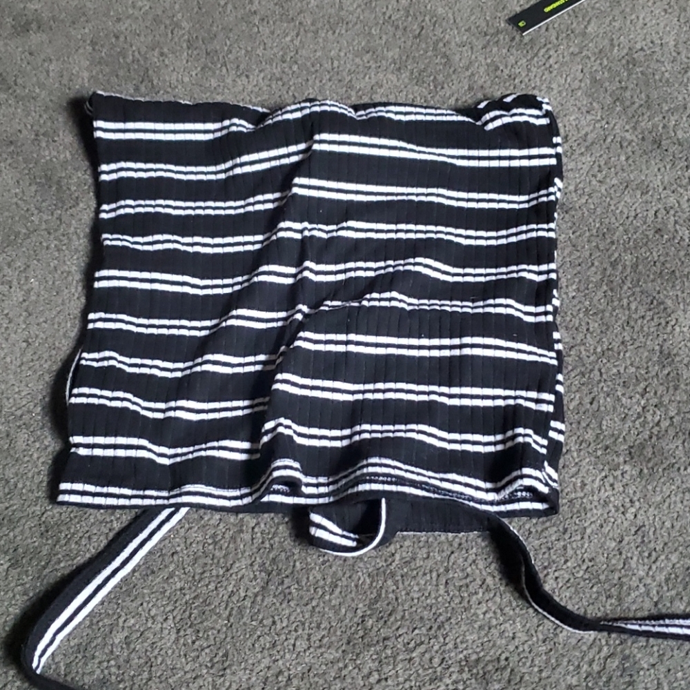 It is a black and white tank top